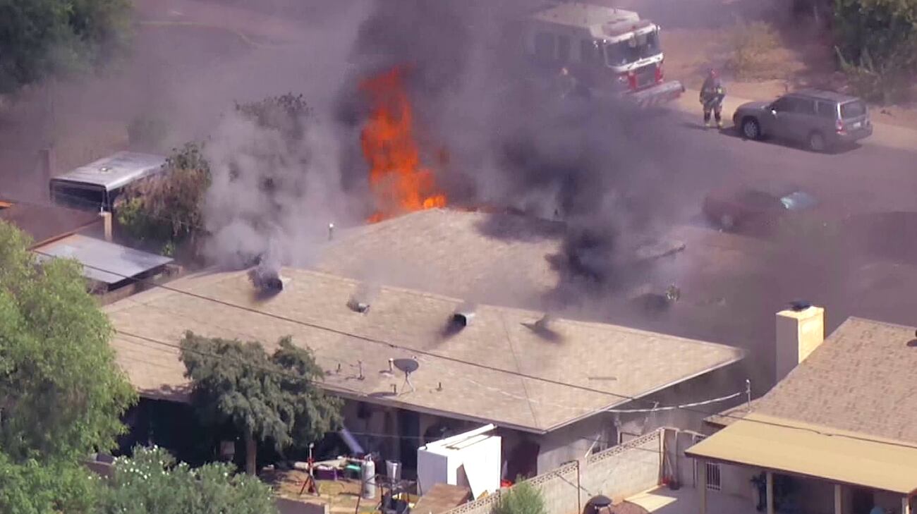 Home erupts in flames as US Marshals involved in deadly shooting in Tempe