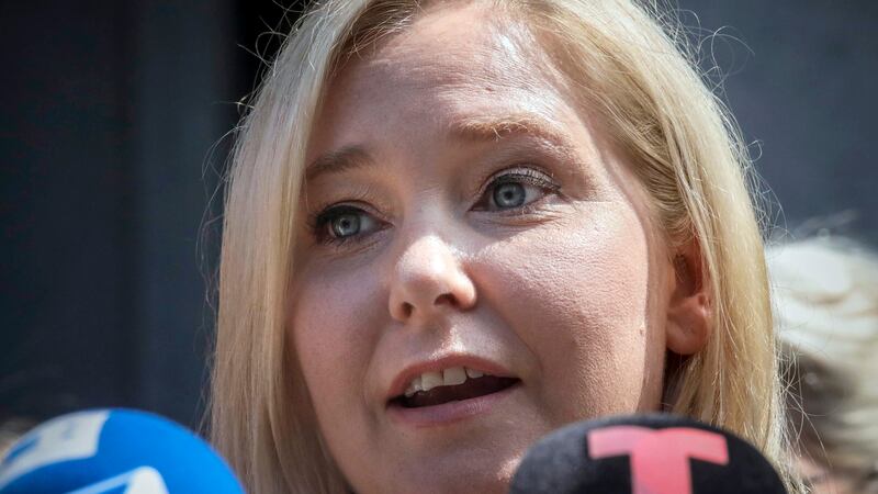 FILE - Virginia Giuffre speaks during a news conference outside a Manhattan court in New York,...