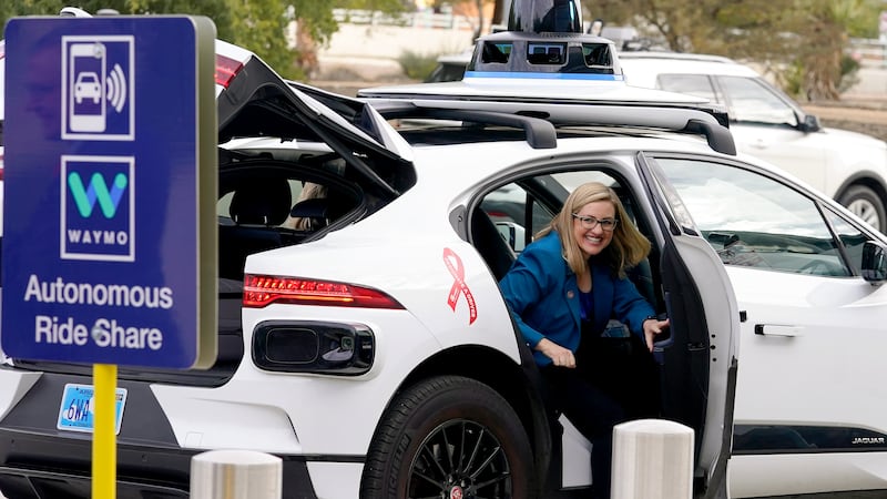 FILE - Phoenix Mayor Kate Gallego arrives in a Waymo self-driving vehicle on Dec. 16, 2022, at...