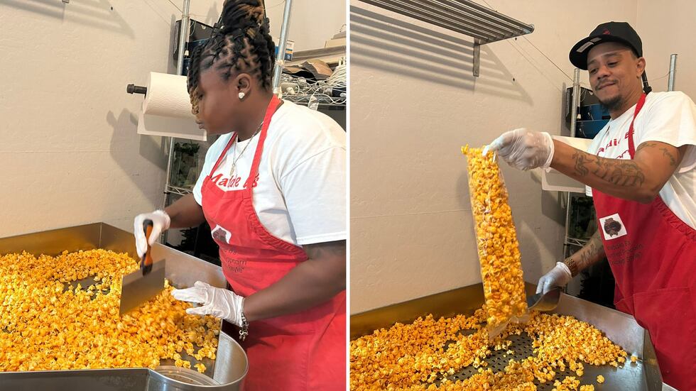 Bianca Dodd (left) sifts the popcorn to remove any husks, then Michael Dodd (right) packages...