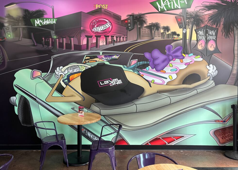 Outcast Doughnuts has an artist-commissioned mural inspired by the Southwest, hip hop, and...