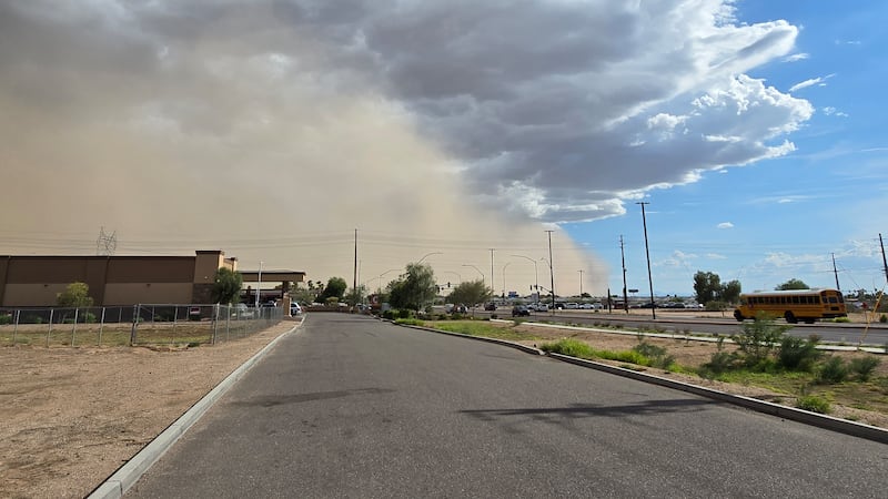 Wall of dust (haboob) blowing in the sky.