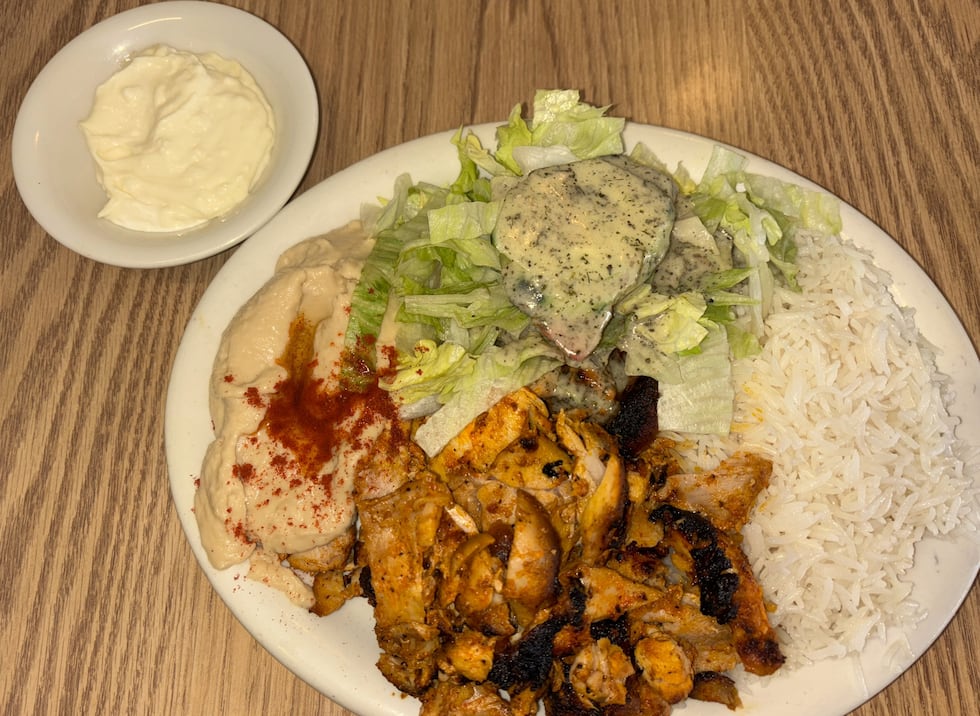 franetic-digital-marketing Chicken Shawarma plate served with grilled, marinated chicken, rice, hummus, salad and garlic sauce.