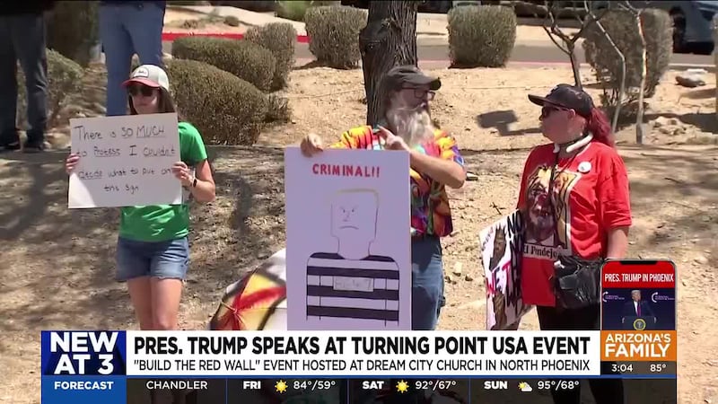Some protestors lined the security entrance into the Dream Church in north Phoenix.